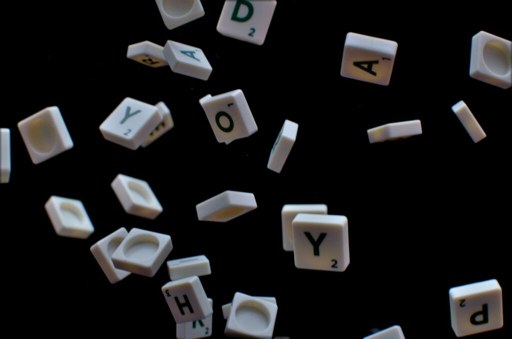 white and black letter t-letter blocks